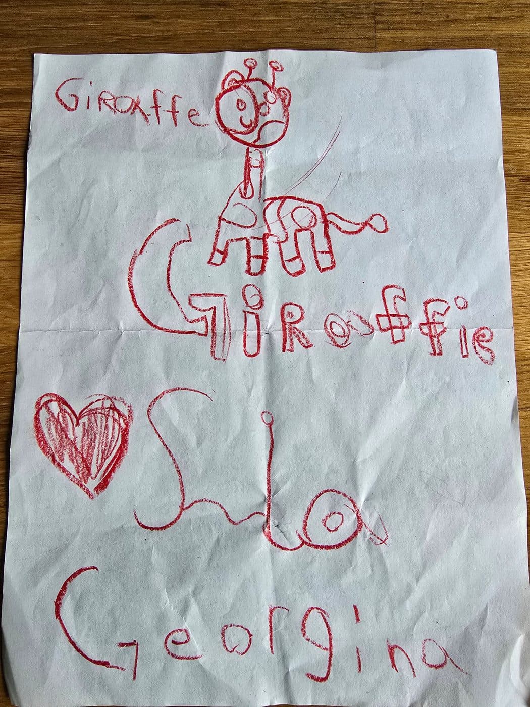 A giraffe, signed by the artist
